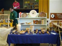 Orchard demonstration table & Paul working hard